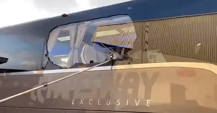 利物浦球迷砸烂皇马大巴车窗, 险伤到齐达内